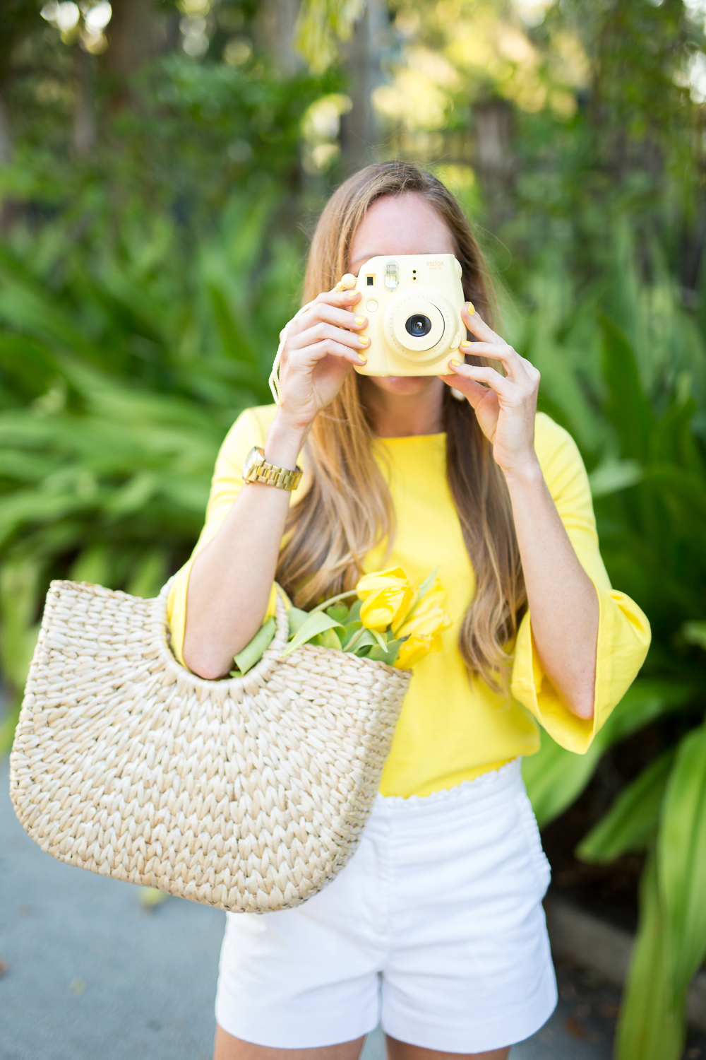 Classic Spring Outfit Idea - Yellow Top, Tulips, Instax Camera