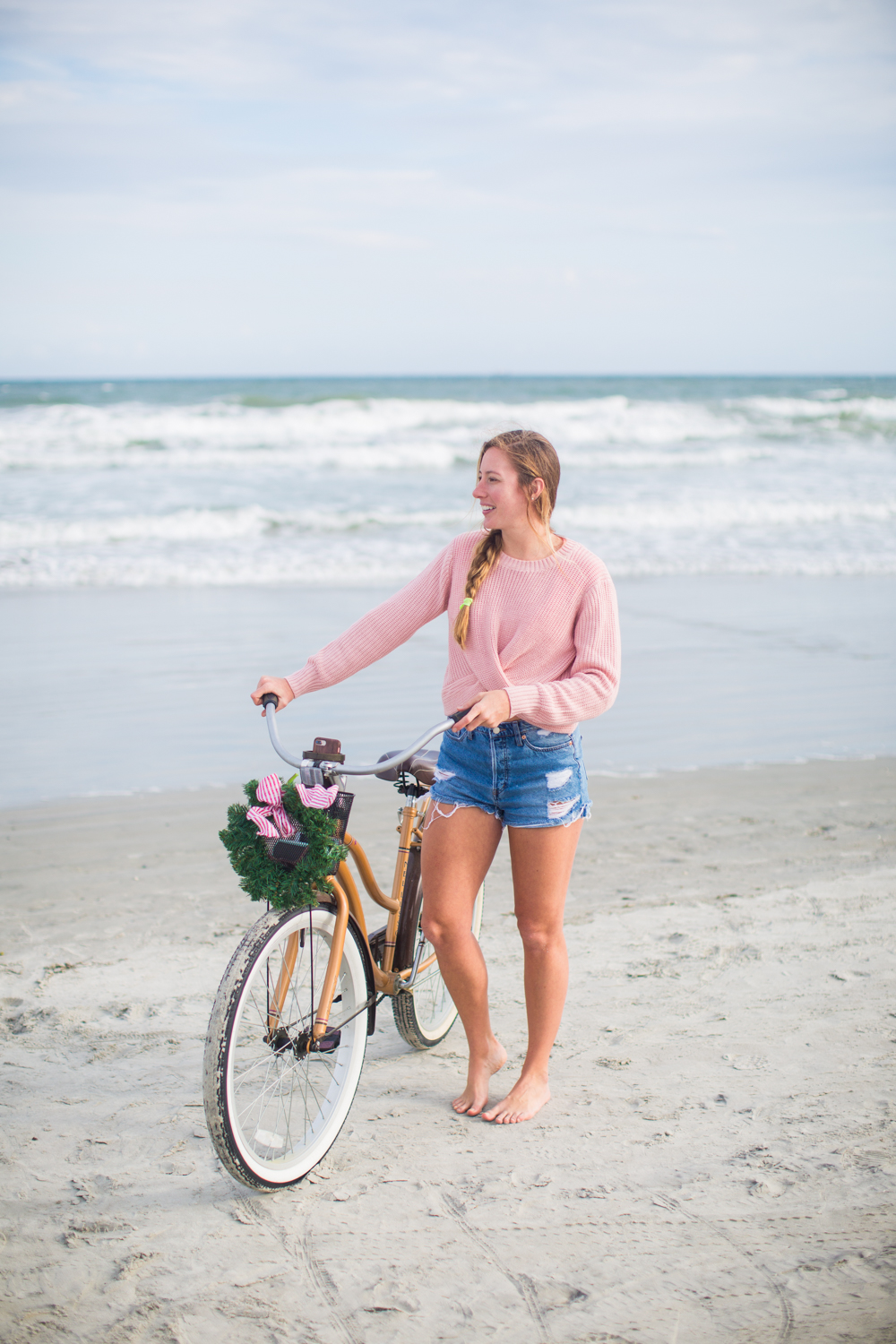 Sweaters to Wear During the Holiday Season | Beach Bike Ride | Winter Outfit Ideas | Christmas in Florida | Beach Bike Ride | Cropped Pink Sweater | Twisted Back Sweater | Winter Sweater Outfit