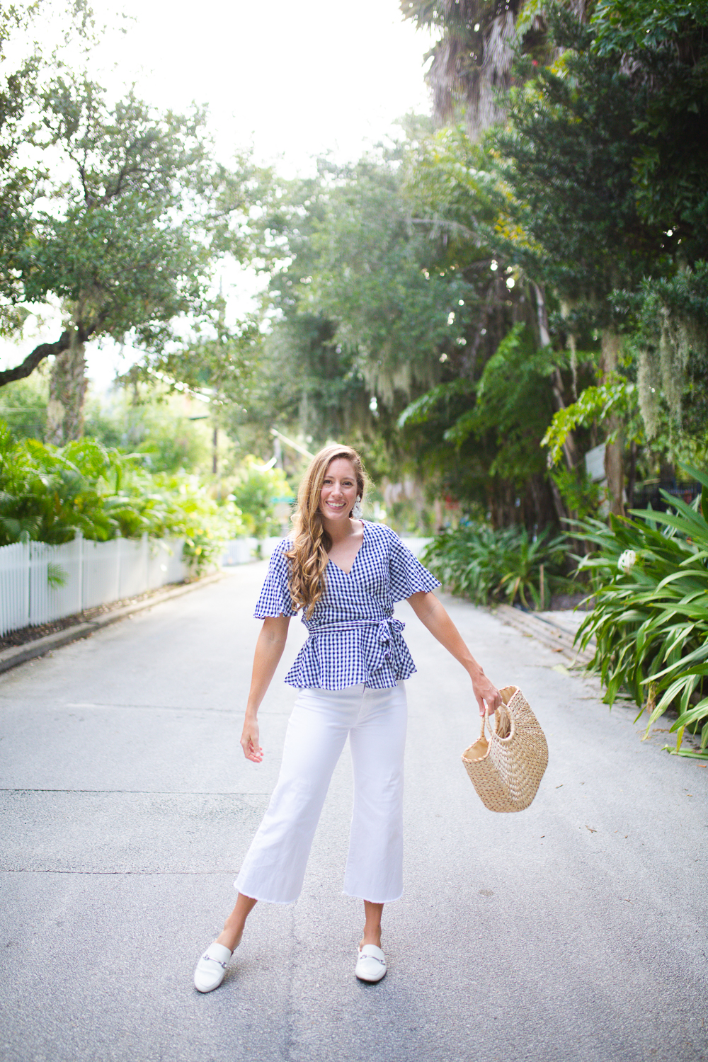 Classic Blue and White End of Summer Outfit / How to Style Wide Leg Pants / How to Style a Wrap Top / Summer Outfit Inspiration / Coastal Outfit Inspiration / Gingham Wrap Top / White Casual Wide Leg Pants / Backless Mules / Straw Bag - Sunshine Style