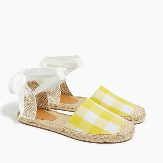 a pair of shoes for spring with yellow gingham print