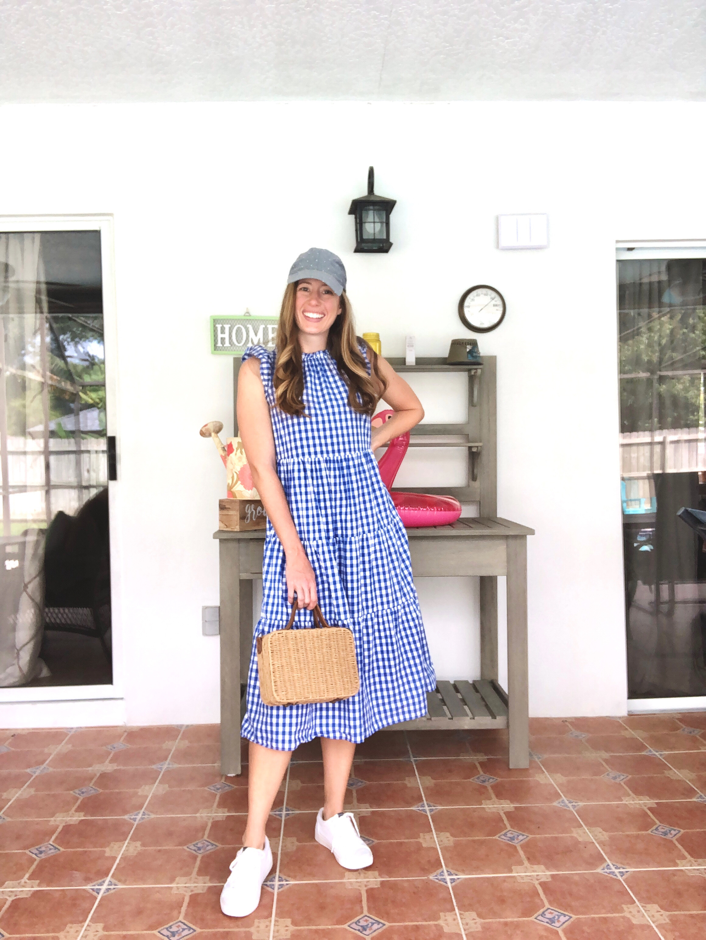 Blue Gingham Babydoll A-line Dress with White Sneakers and a baseball cap